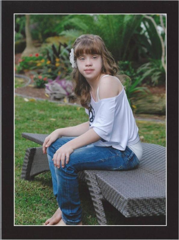 Success Story: Sara was born with Trisomy 21 and now she goes to school and continues to be above average. 